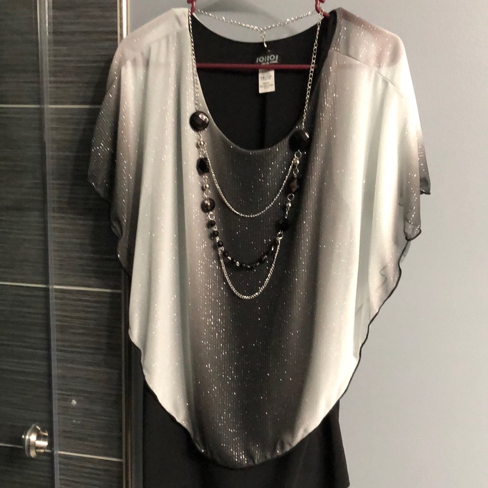 Black and white top with attached necklace